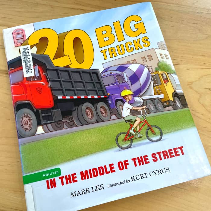 '20 big trucks in the middle of the street' book cover